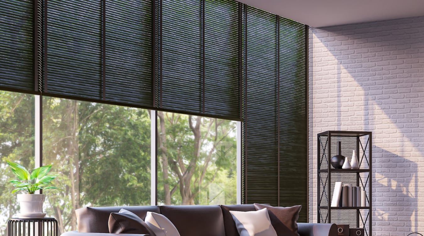  Woven shades covering corner windows.